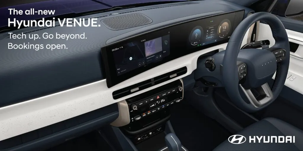 Interior dashboard of the all-new Hyundai Venue featuring the integrated dual 12.3-inch curved panoramic displays for the ccNC infotainment and cluster.