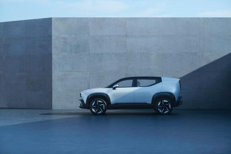 Side profile of the all-new Honda 0 α (Alpha) electric SUV prototype, displaying its sleek, minimalist 'Thin, Light, and Wise' design and 19-inch alloy wheels